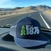 Spirit Apparel Spirit Of 1876 Logo Flatbill Trucker Hat W/ Topo Lines