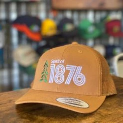 Spirit Apparel Spirit Of 1876 Logo Low Profile Curved Bill Snapback Trucker In Harcartt Brown